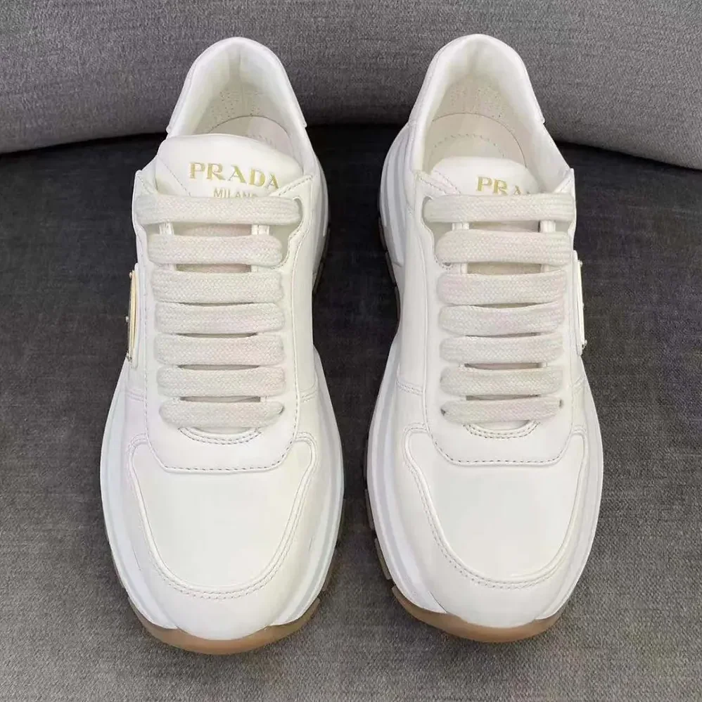 Prada Triangle Logo Leather Sneakers for Unisex in White