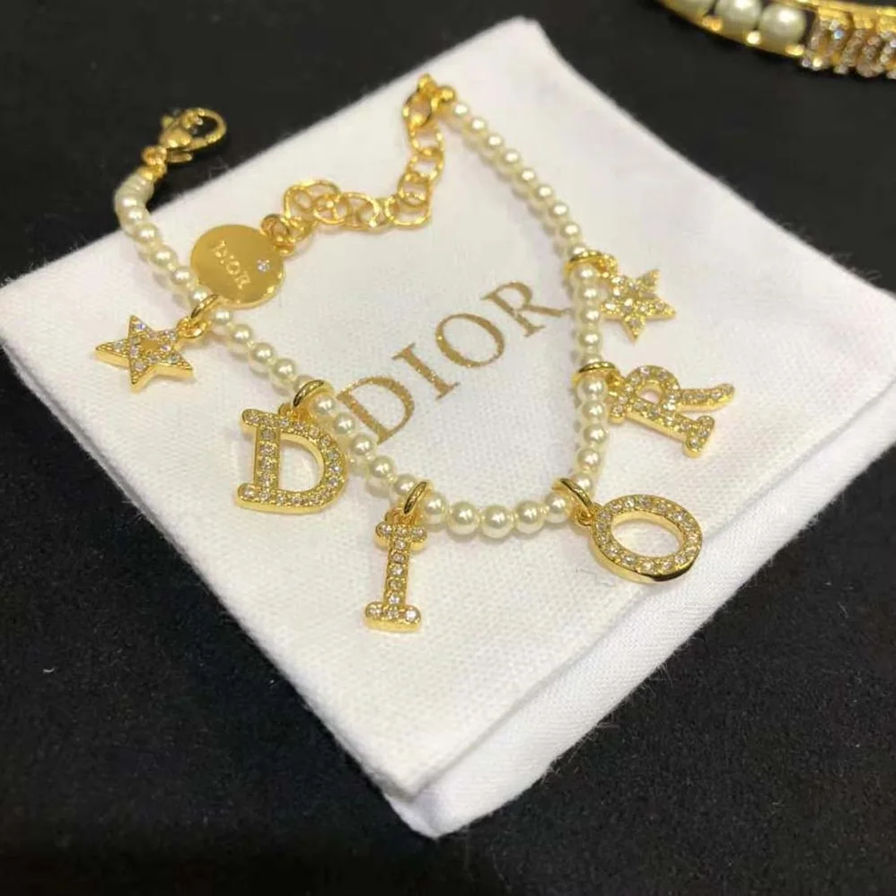 Dior Dio(r)evolution Bracelet Gold-Finish Metal White Resin Pearls and White Crystals for Women Dior Dio(r)evolution Bracelet Gold-Finish Metal White Resin Pearls and White Crystals for Women
