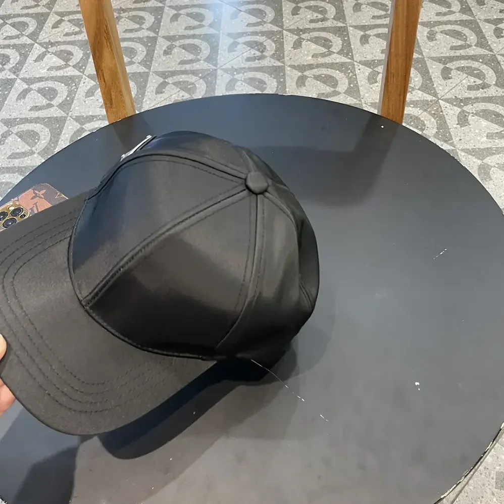Prada Re-Nylon Baseball Cap for Unisex in Black Prada Re-Nylon Baseball Cap for Unisex in Black