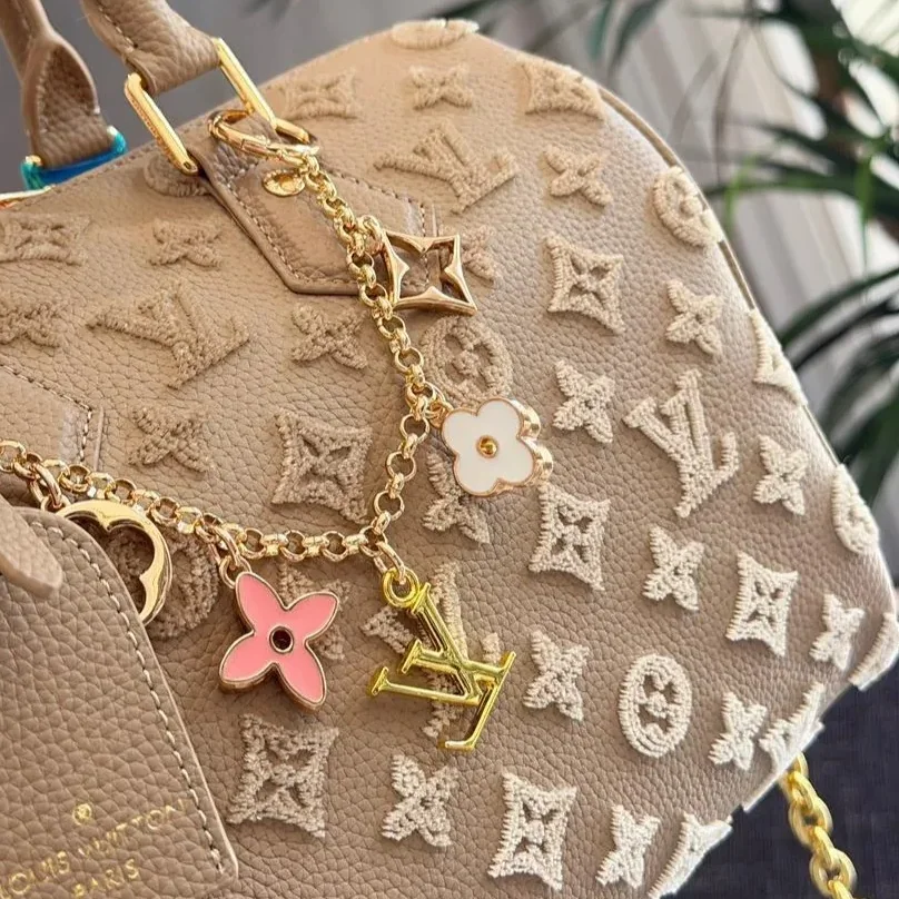 Louis Vuitton Speedy Bandouliere 25 Top Handle Bag in Light Brown