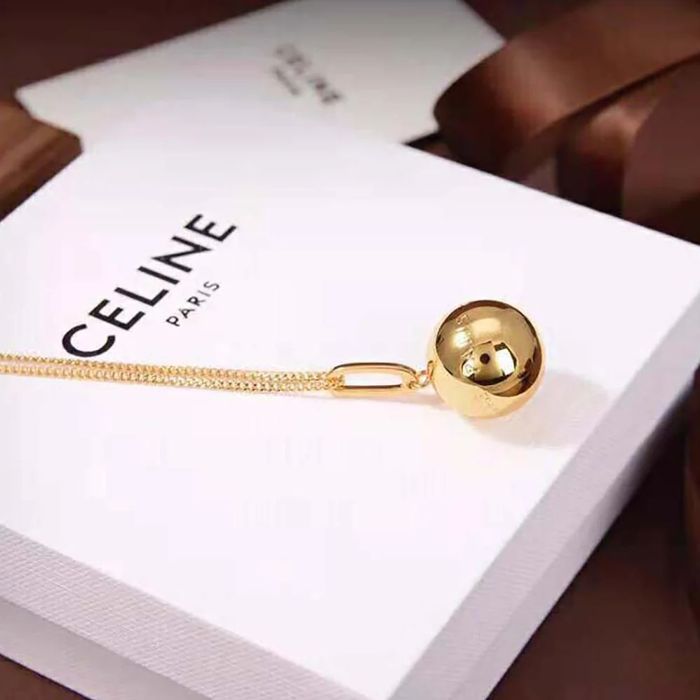 Celine Separables Boule Celine Paris Pendant in Brass with Gold Finish for Women