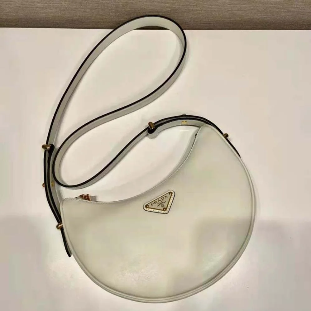 Prada Leather Shoulder Bag with Enameled Metal Triangle Logo for Women in White