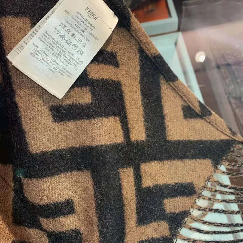 Fendi Brown Cashmere Poncho with Hood and Maxi Pockets on the front for Women Fendi Brown Cashmere Poncho with Hood and Maxi Pockets on the front for Women