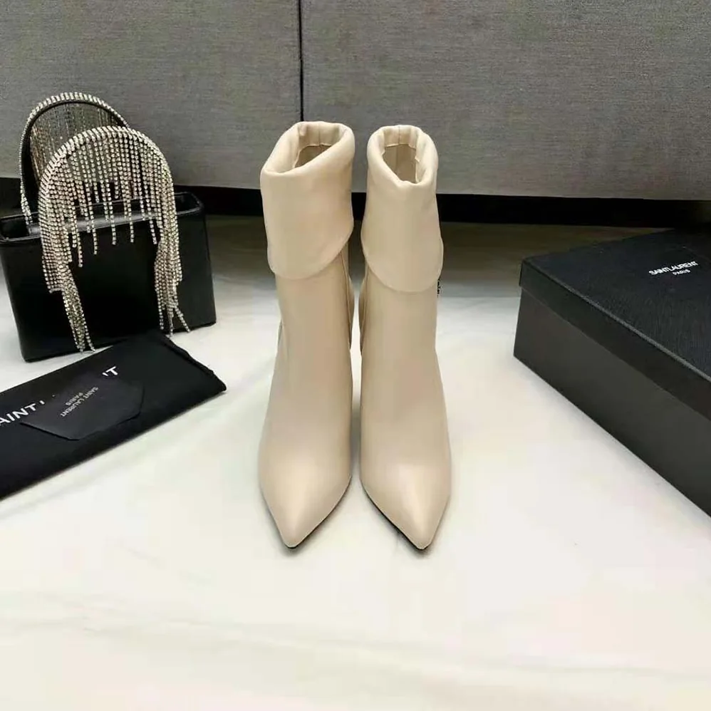 Saint Laurent YSL Niki Booties in Smooth Leather and Silver-Tone Monogram for Women in White Saint Laurent YSL Niki Booties in Smooth Leather and Silver-Tone Monogram for Women in White