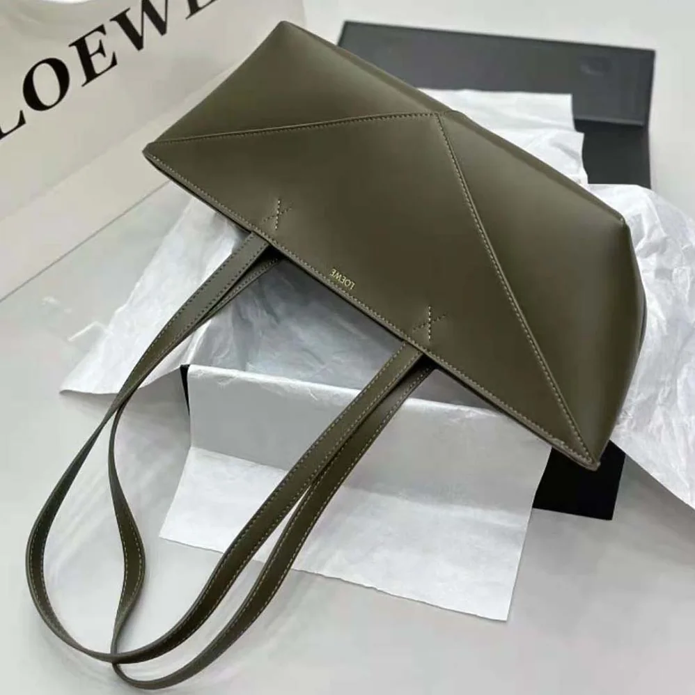 Loewe Cropped Puzzle Fold Bag in Shiny Calfskin for Women in Green Loewe Cropped Puzzle Fold Bag in Shiny Calfskin for Women in Green