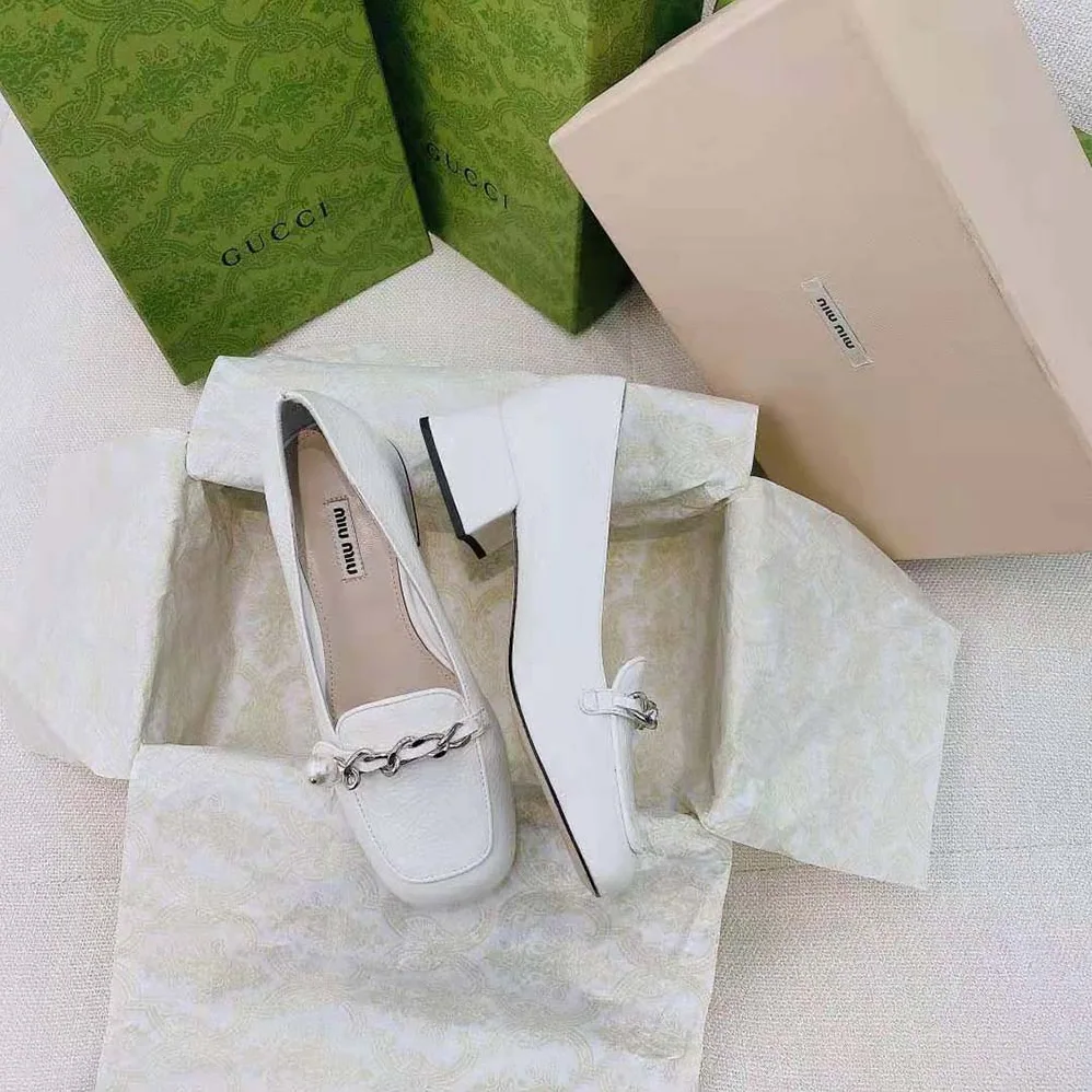 Miu Miu Patent Leather Loafers in 35mm Heel for Women in White Miu Miu Patent Leather Loafers in 35mm Heel for Women in White