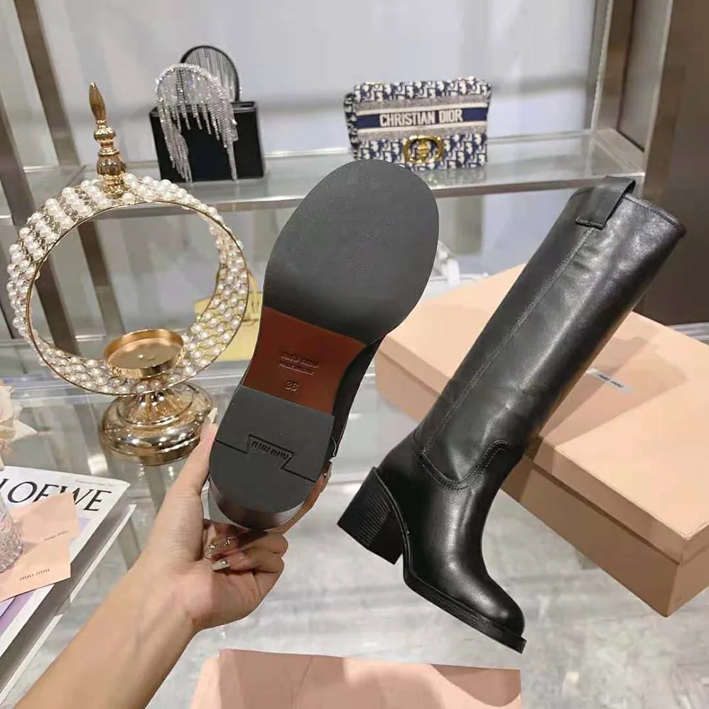 Miu Miu Leather Booties with Screen-printed Logo for Women in Black