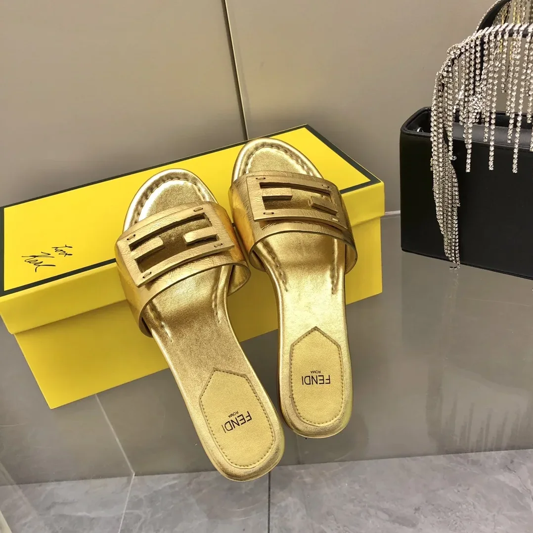 Fendi Baguette Gold Nappa Slides 8R8136AI16F0XV6 Fendi Baguette Gold Nappa Slides 8R8136AI16F0XV6