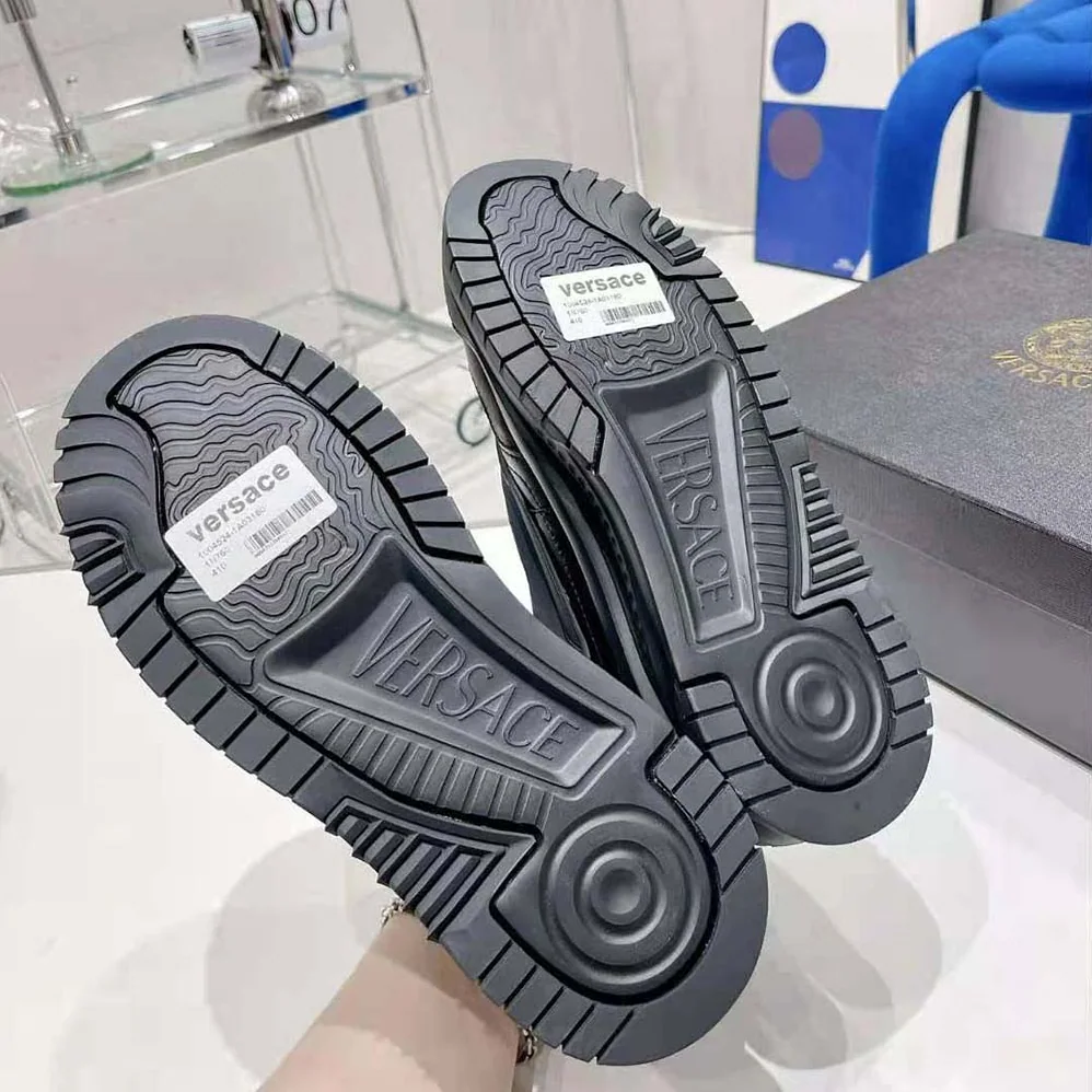 Versace Odissea Sneakers are Set on Rubber Soles with Perforated Toe Caps for Unisex in Black Versace Odissea Sneakers are Set on Rubber Soles with Perforated Toe Caps for Unisex in Black