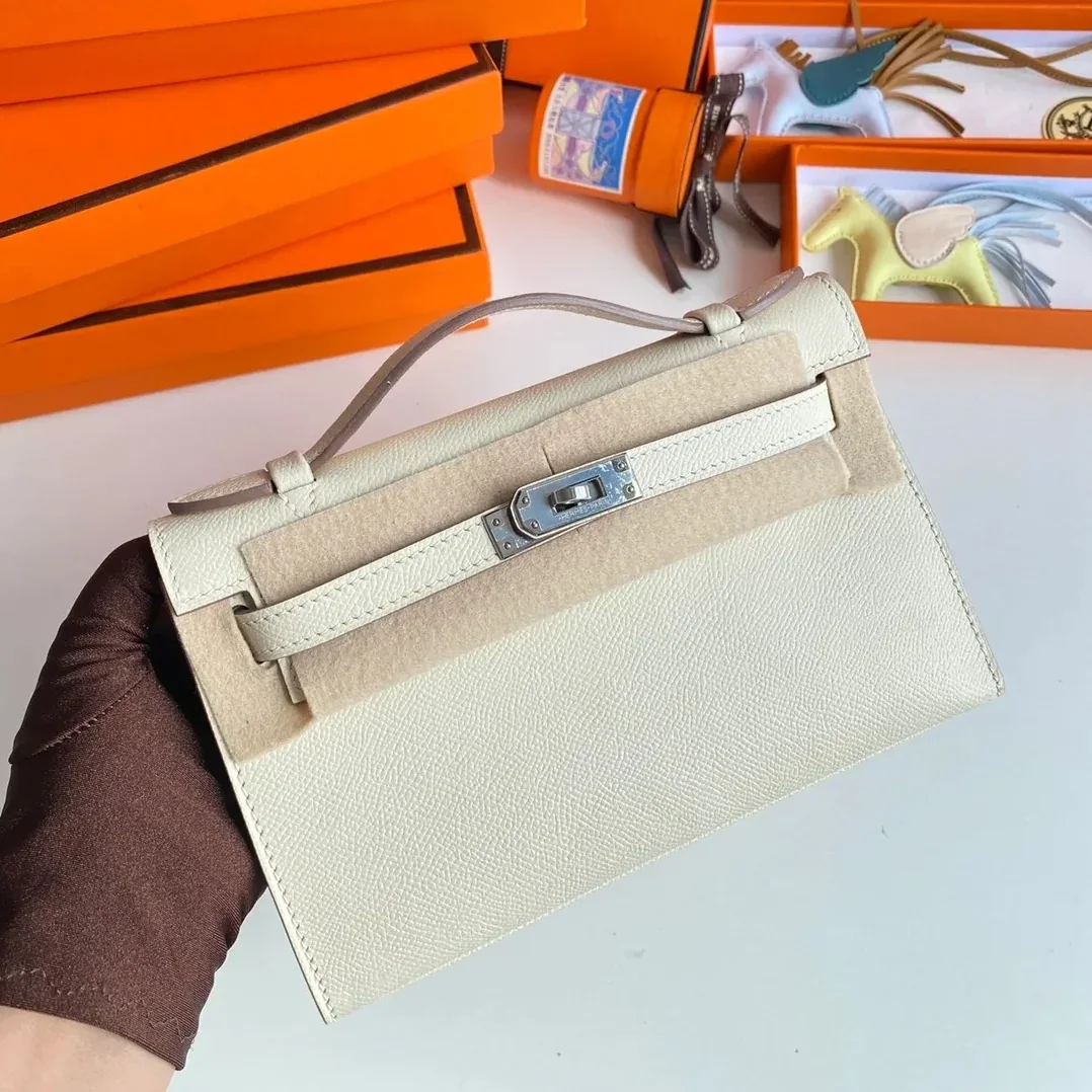 Hermes Kelly Pochette Top Handle Bag in Blanc Epsom Palladium Hardware