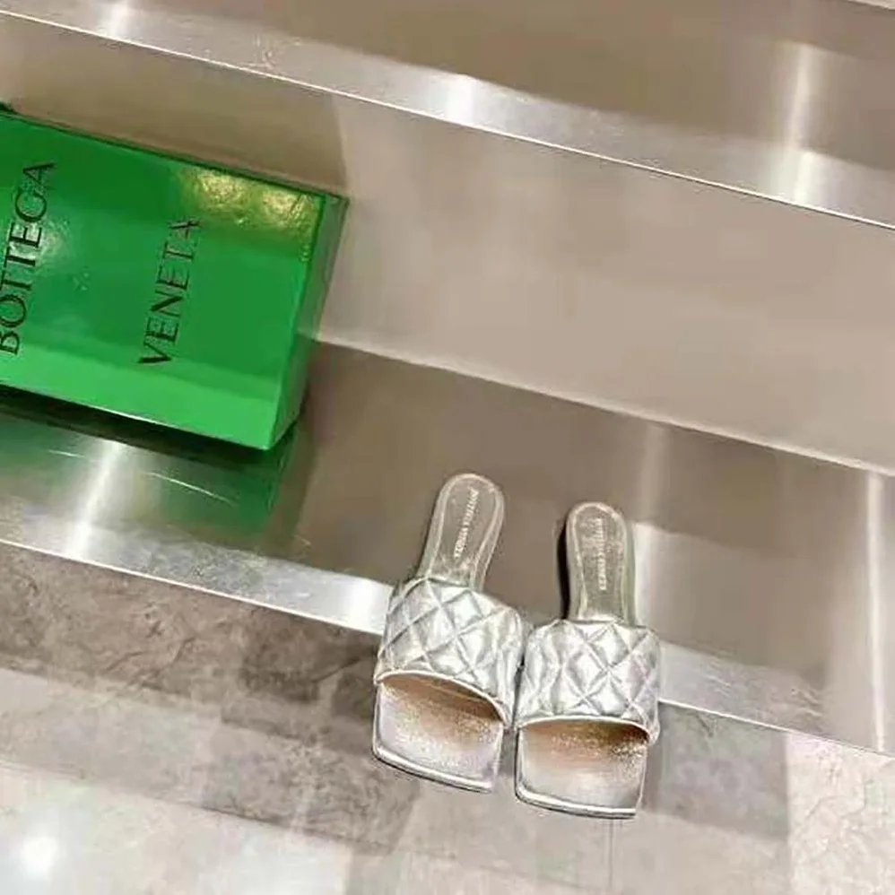 Bottega Veneta Lido Flat Sandal Intreccio Metallised Leather Flat Sandals for Women in Silver