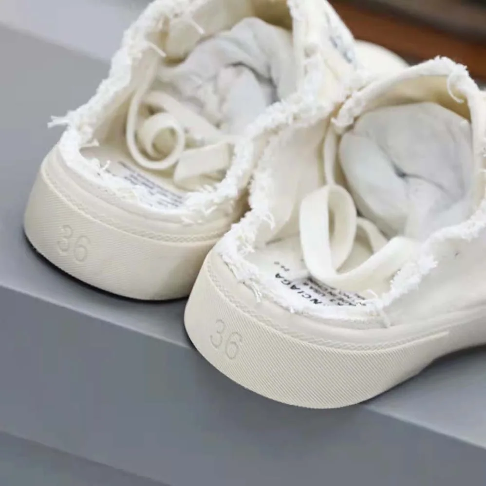 Balenciaga Paris Sneaker Mule in White Destroyed Cotton and White Rubber for Unisex Balenciaga Paris Sneaker Mule in White Destroyed Cotton and White Rubber for Unisex