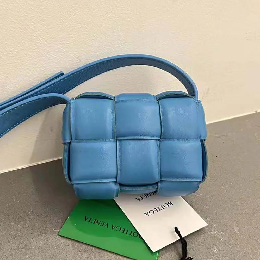 Bottega Veneta Candy Padded Cassette Mini Padded Intreccio Leather Cross-Body Bag for Women in Blue Bottega Veneta Candy Padded Cassette Mini Padded Intreccio Leather Cross-Body Bag for Women in Blue