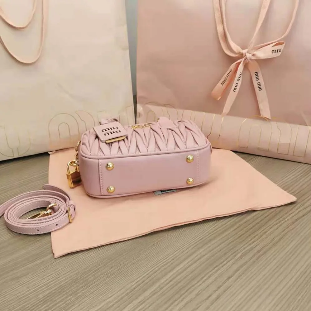 Miu Miu Matelassé Nappa Leather Top-Handle Bag for Women in Pink Miu Miu Matelassé Nappa Leather Top-Handle Bag for Women in Pink
