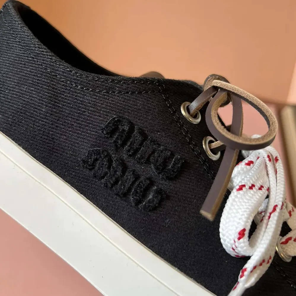 Miu Miu Washed Denim Sneakers for Women in Black Miu Miu Washed Denim Sneakers for Women in Black