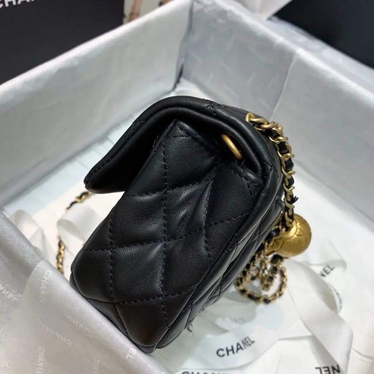 Chanel Flap Bag With CC Ball On Strap Small Crossbody in Black Gold Hardware