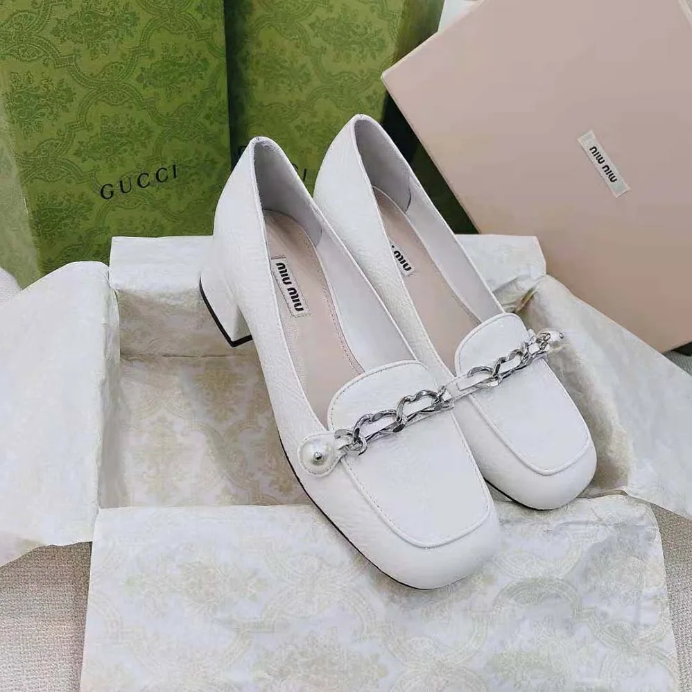 Miu Miu Patent Leather Loafers in 35mm Heel for Women in White Miu Miu Patent Leather Loafers in 35mm Heel for Women in White