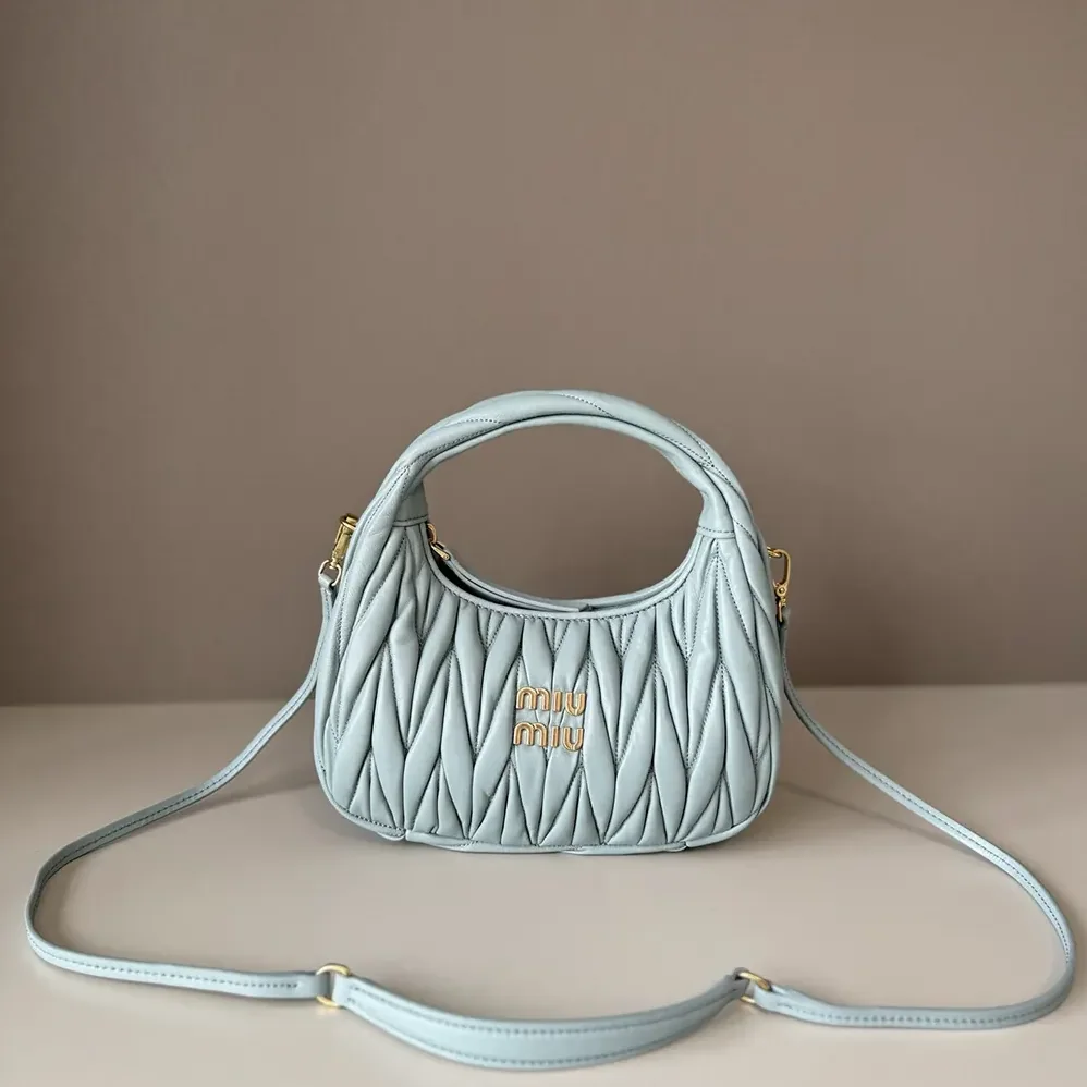 Miu Miu Wander Matelassé Nappa Leather Hobo Bag for Women in Powder Blue Miu Miu Wander Matelassé Nappa Leather Hobo Bag for Women in Powder Blue
