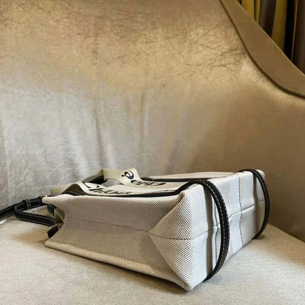 Chloe Small Woody Tote Bag in Cotton Canvas and Shiny Calfskin with Woody Ribbo for Women in Black Chloe Small Woody Tote Bag in Cotton Canvas and Shiny Calfskin with Woody Ribbo for Women in Black