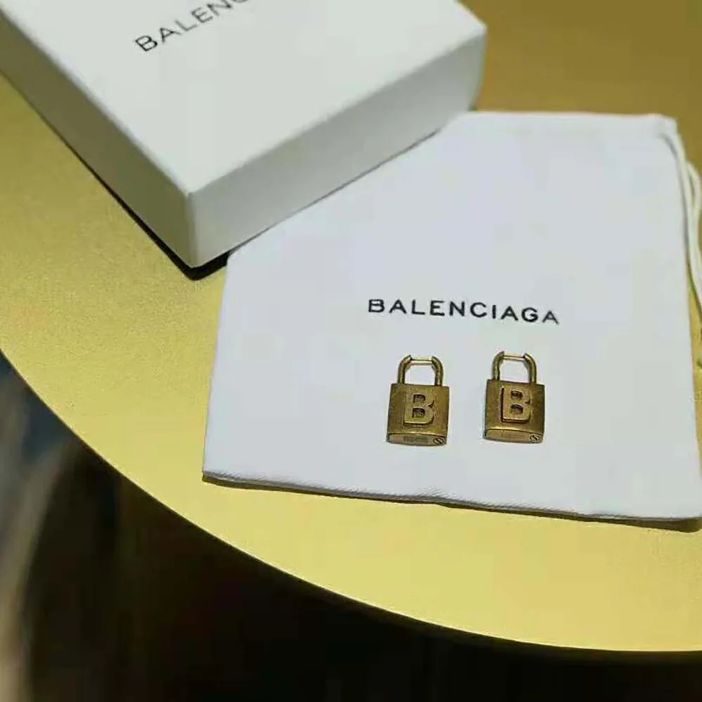 Balenciaga Lock Small Earrings in Aged for Women in Gold Brass Balenciaga Lock Small Earrings in Aged for Women in Gold Brass