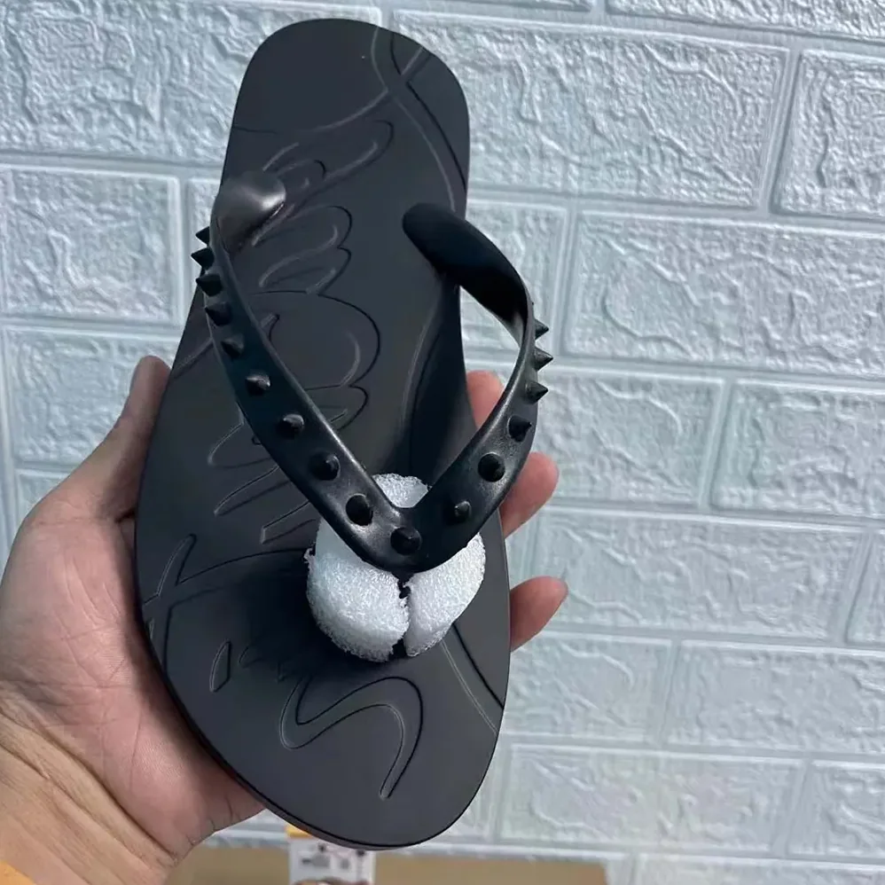 Christian Louboutin Loubi Donna Spike Red Sole Flip Flops for Men in Black Christian Louboutin Loubi Donna Spike Red Sole Flip Flops for Men in Black