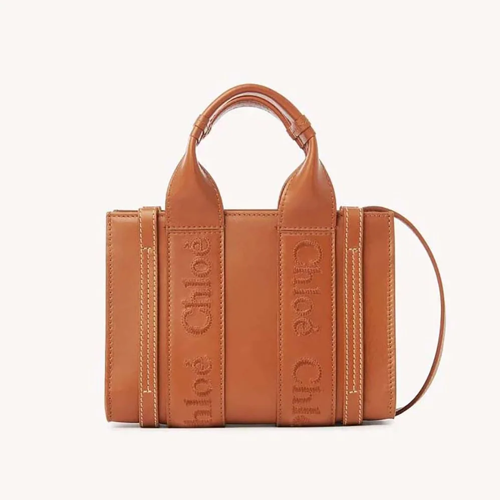 Chloe Mini Woody Tote Bag with Embroidered Chloé Logo for Women in Brown Chloe Mini Woody Tote Bag with Embroidered Chloé Logo for Women in Brown