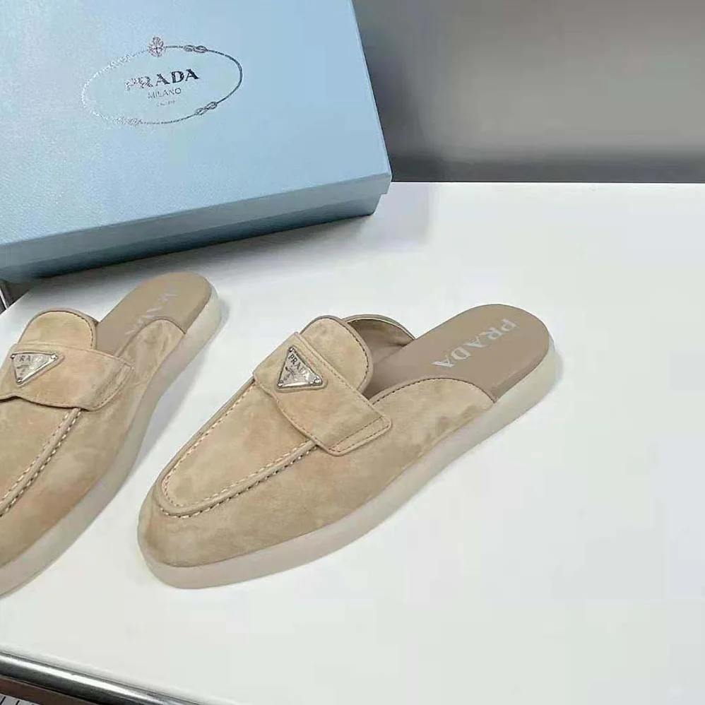 Prada Suede Leather Sabots with Enameled Metal Triangle Logo for Unisex in Brown