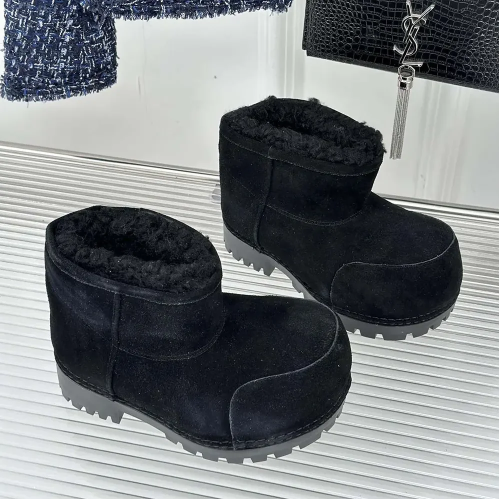 Balenciaga Alaska Fur Bootie in Black Split Calfskin and Synthetic Material for Unisex Balenciaga Alaska Fur Bootie in Black Split Calfskin and Synthetic Material for Unisex