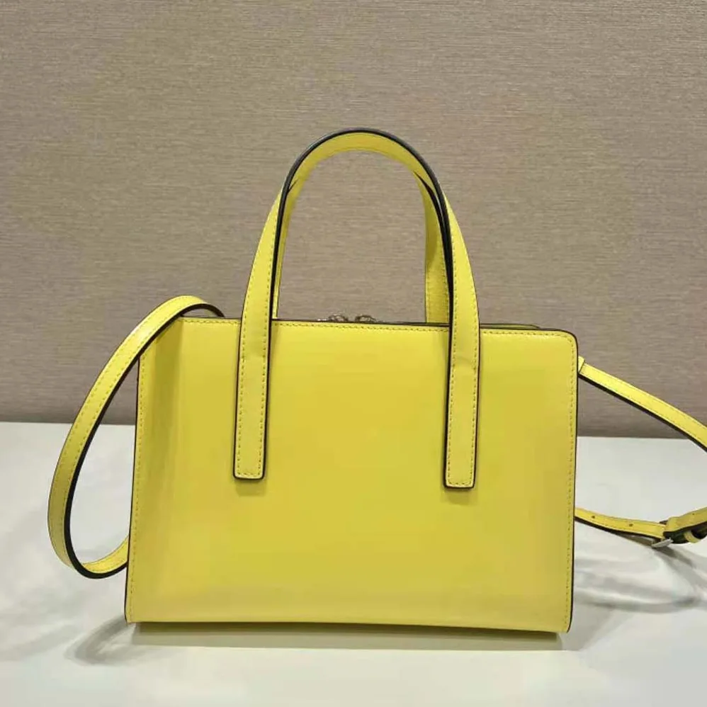 Prada Re-Edition 1995 Brushed-Leather Mini Handbag for Women in Yellow Prada Re-Edition 1995 Brushed-Leather Mini Handbag for Women in Yellow