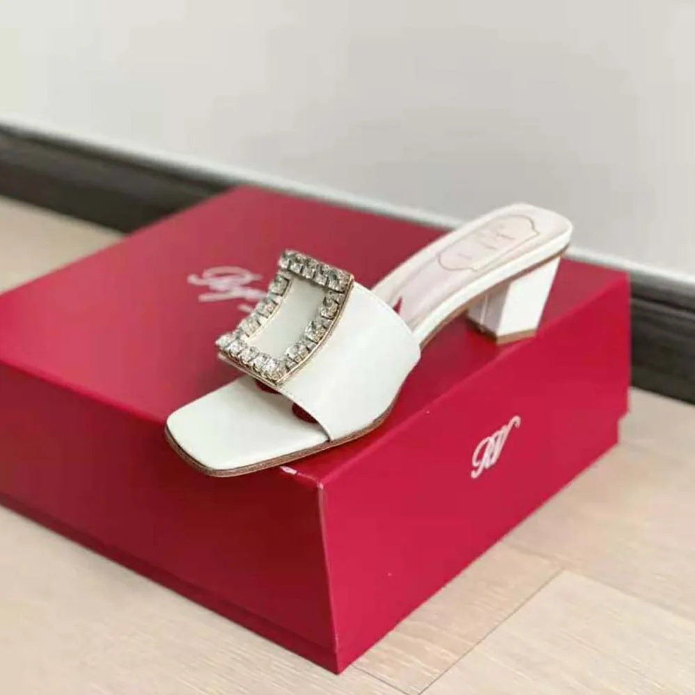 Roger Vivier Biki Love Strass Buckle Mules in Leather for Women in White Roger Vivier Biki Love Strass Buckle Mules in Leather for Women in White