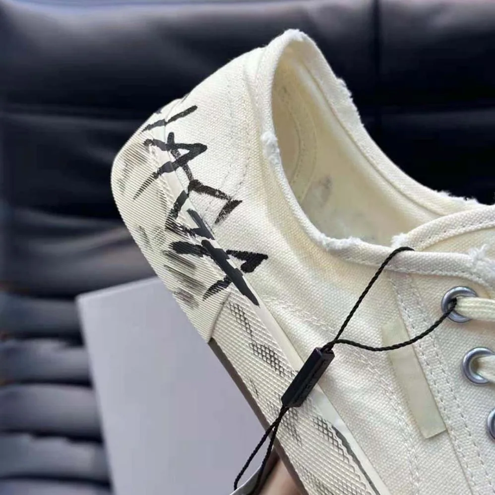 Balenciaga Paris Low Top Graffiti Sneaker in White for Unisex Balenciaga Paris Low Top Graffiti Sneaker in White for Unisex