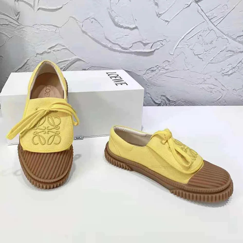 Loewe Anagram Flap Sneaker in Canvas for Women in Yellow Loewe Anagram Flap Sneaker in Canvas for Women in Yellow