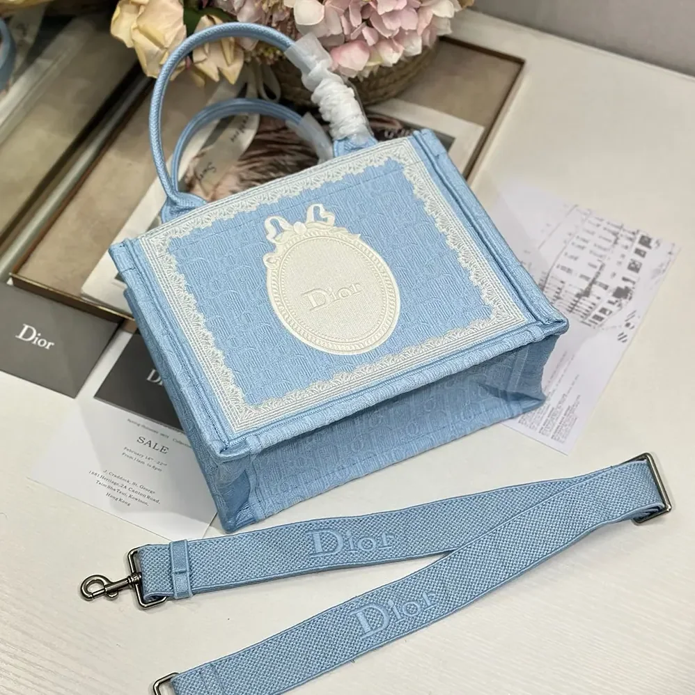 Dior Small Dior Book Tote with Strap Celestial Blue Dior Oblique Embroidery with White Lace and Dior Médaillon for Women Dior Small Dior Book Tote with Strap Celestial Blue Dior Oblique Embroidery with White Lace and Dior Médaillon for Women