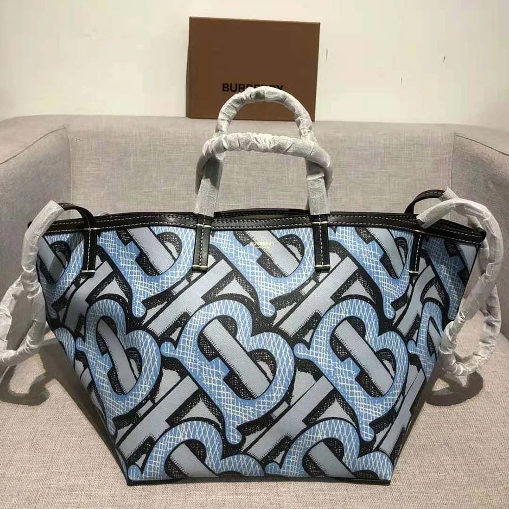 Burberry Mini Monogram Print E-canvas Beach Tote for Women in Blue Burberry Mini Monogram Print E-canvas Beach Tote for Women in Blue
