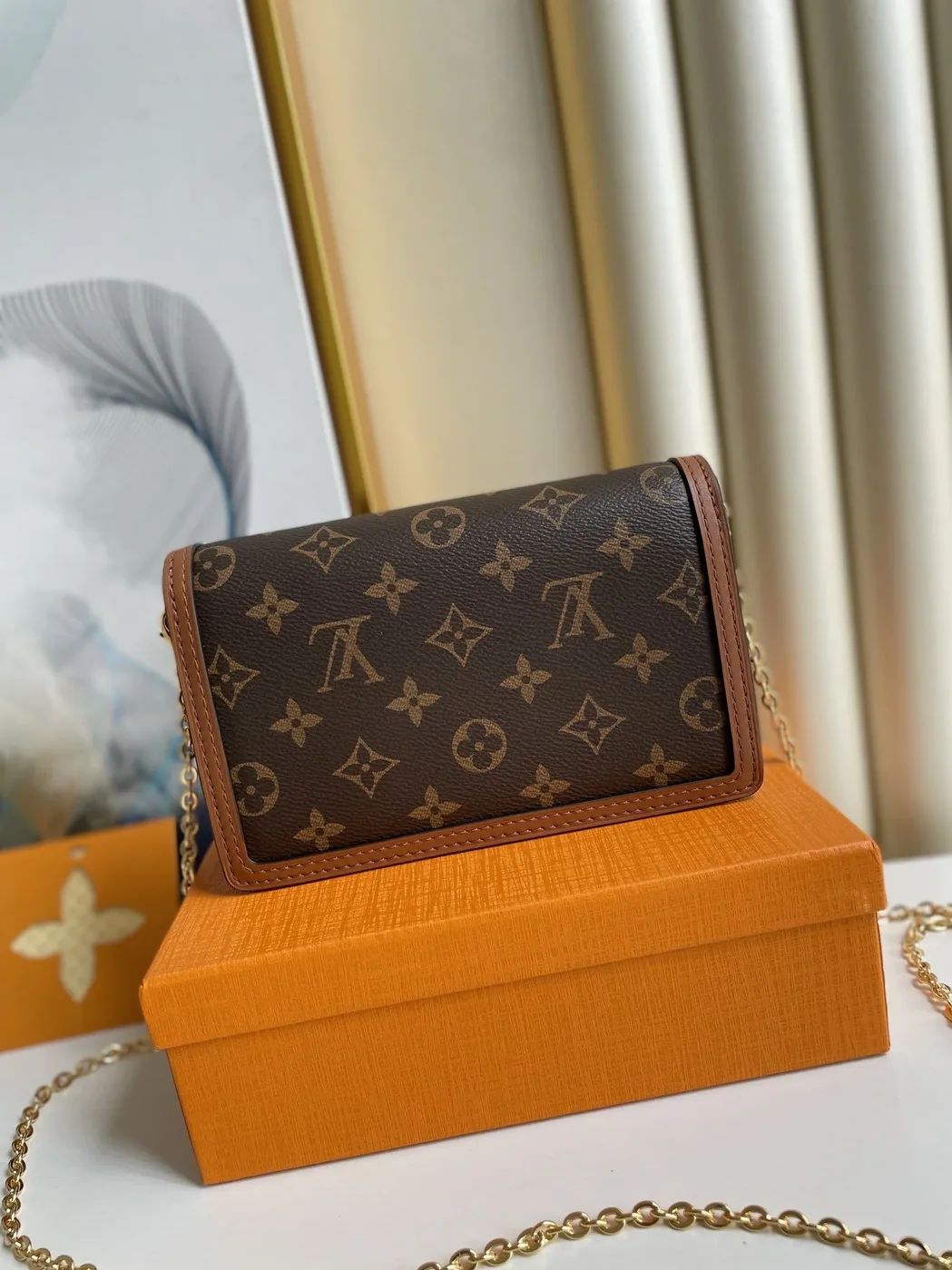 Louis Vuitton Dauphine Chain Wallet Combines Monogram And Monogram Reverse Canvas By Nicolas Ghesquière