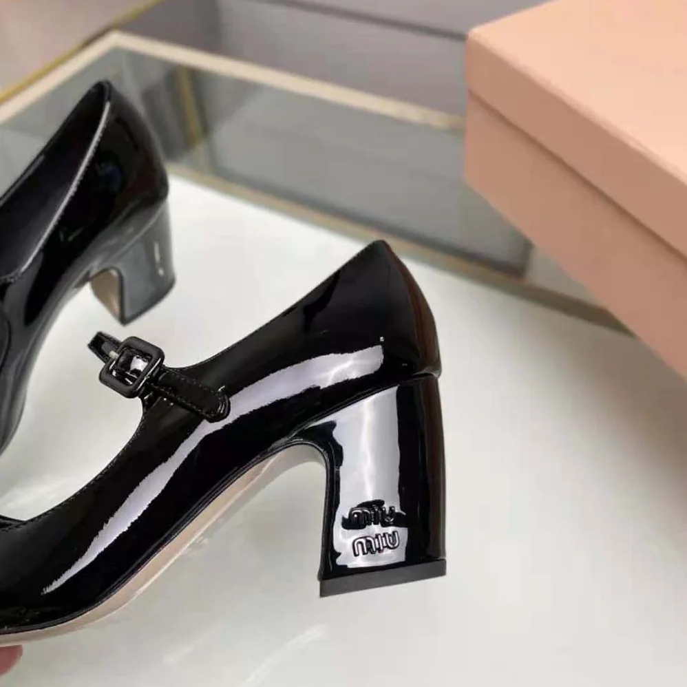 Miu Miu Patent Leather Pumps with Metal Lettering Logo for Women in Black Miu Miu Patent Leather Pumps with Metal Lettering Logo for Women in Black