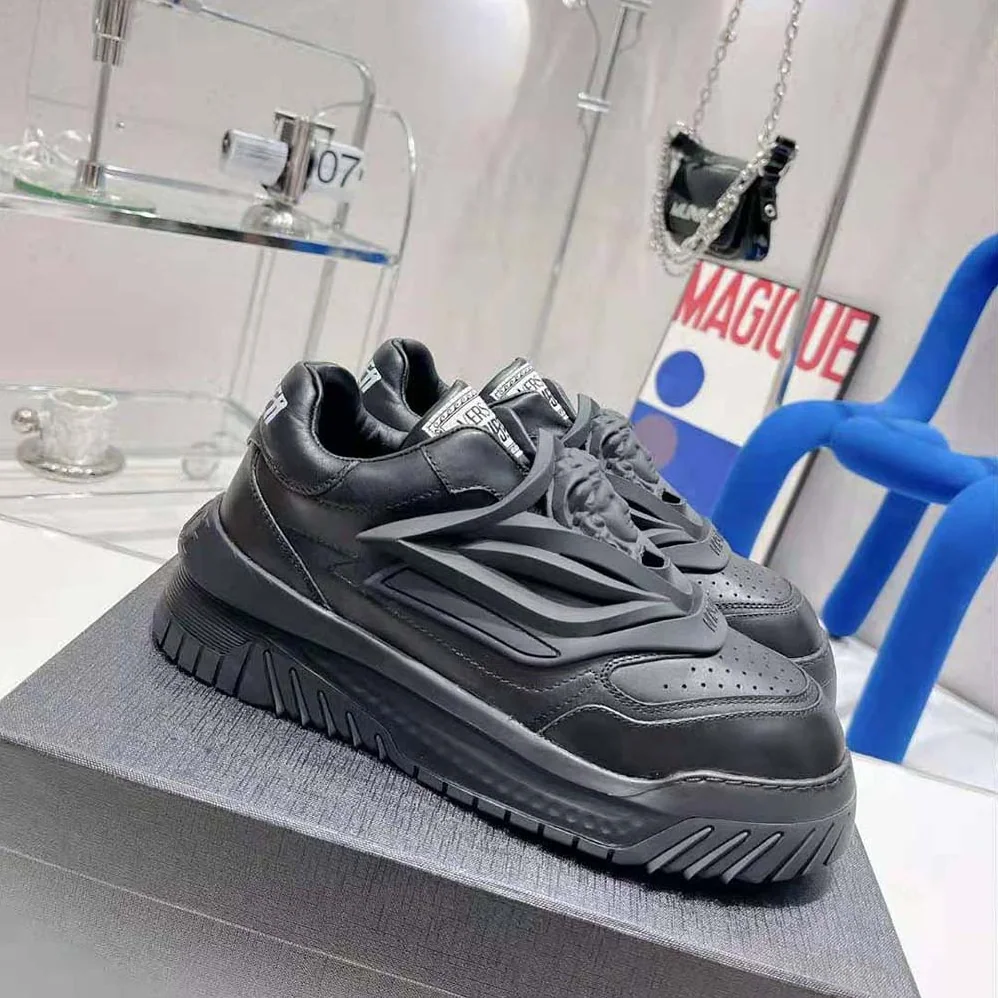 Versace Odissea Sneakers are Set on Rubber Soles with Perforated Toe Caps for Unisex in Black Versace Odissea Sneakers are Set on Rubber Soles with Perforated Toe Caps for Unisex in Black