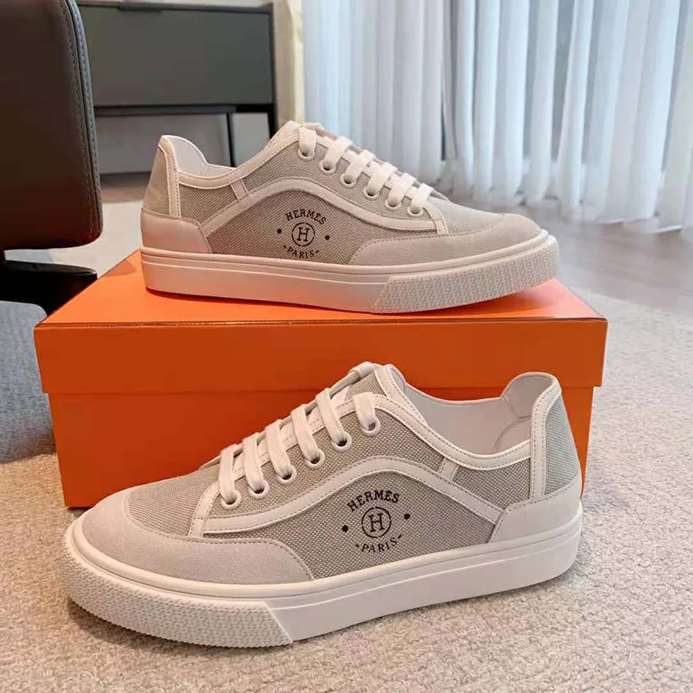 Hermes Get Sneaker in SH Canvas and Calfskin with Signature “Hermès Paris” Stencil for Unisex in Silver Hermes Get Sneaker in SH Canvas and Calfskin with Signature “Hermès Paris” Stencil for Unisex in Silver