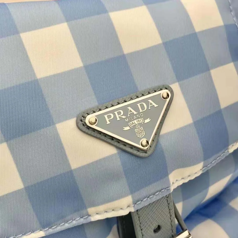 Prada Small Printed Re-Nylon Backpack for Women in Blue Prada Small Printed Re-Nylon Backpack for Women in Blue