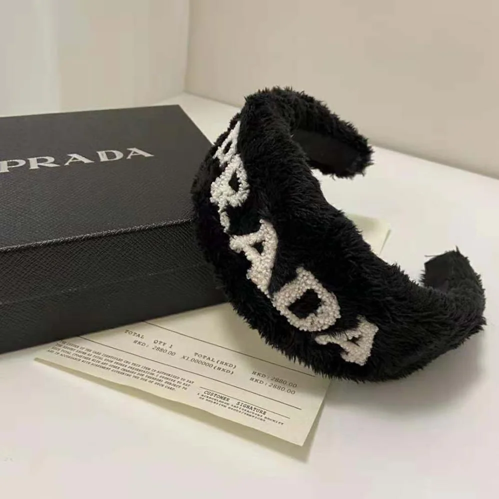 Prada Terrycloth Headband with A Beguiling Rounded Design for Women Prada Terrycloth Headband with A Beguiling Rounded Design for Women