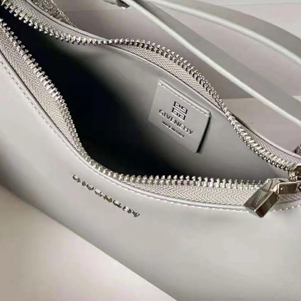 Givenchy Small Moon Cut Out Bag in Leather for Women in Silver