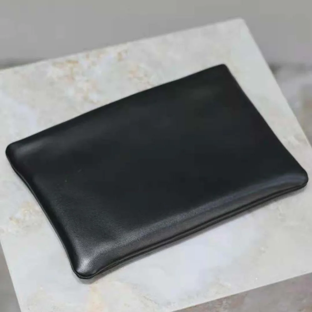 Saint Laurent YSL Calypso Small Pouch in Lambskin for Women in Black Saint Laurent YSL Calypso Small Pouch in Lambskin for Women in Black