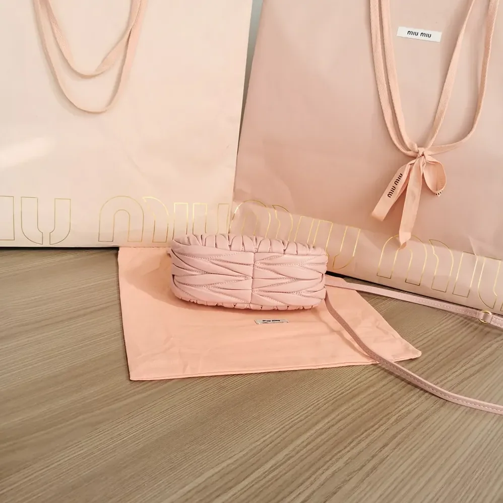 Miu Miu Wander Matelassé Nappa Leather Hobo Mini-Bag for Women in Powder Pink