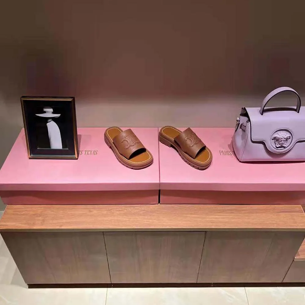 Celine Clea Triomphe Slide in Calfskin & Vegetal Tanning for Women Celine Clea Triomphe Slide in Calfskin & Vegetal Tanning for Women