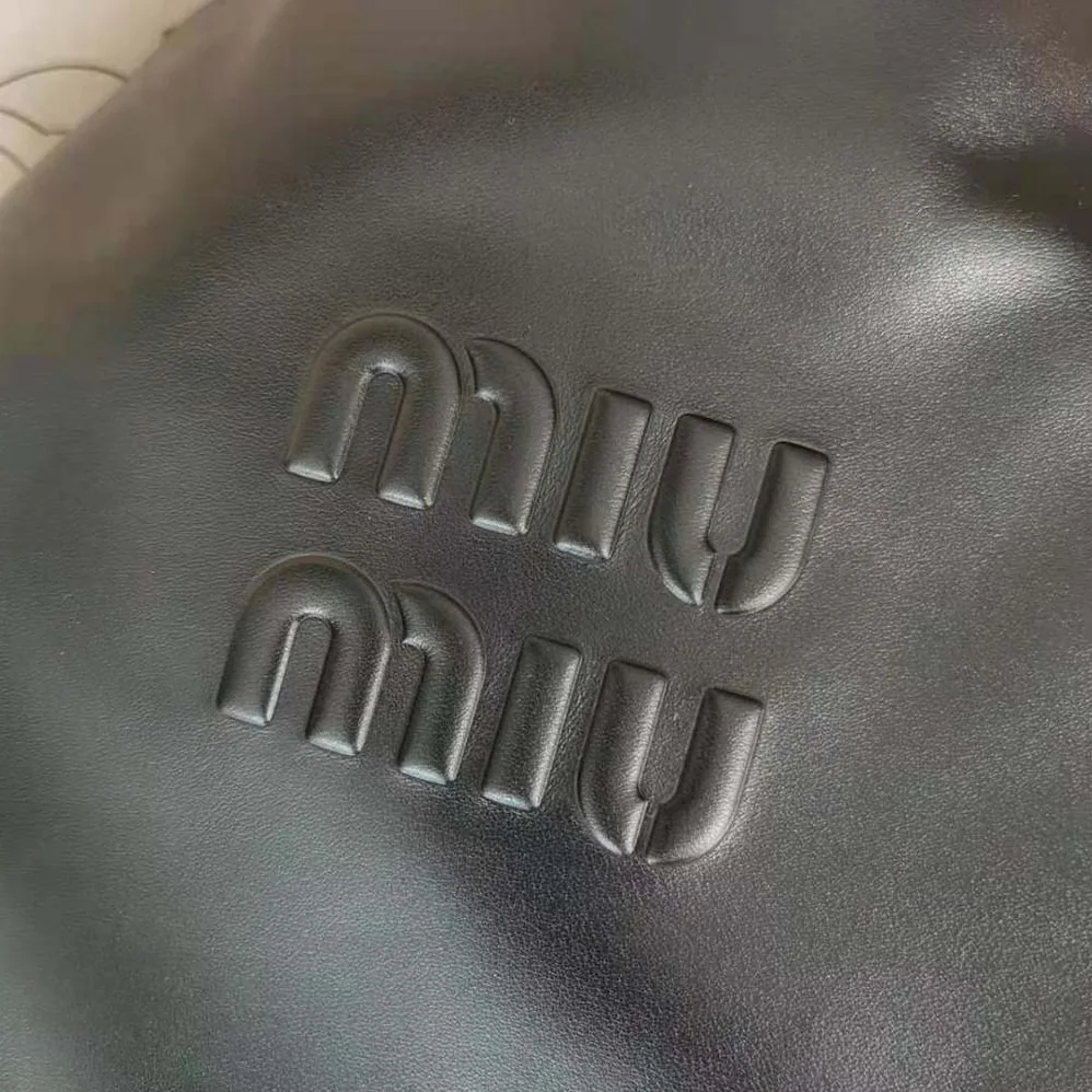 Miu Miu Leather Shoulder Bag with Embossed Lettering Logo on the Front for Women
