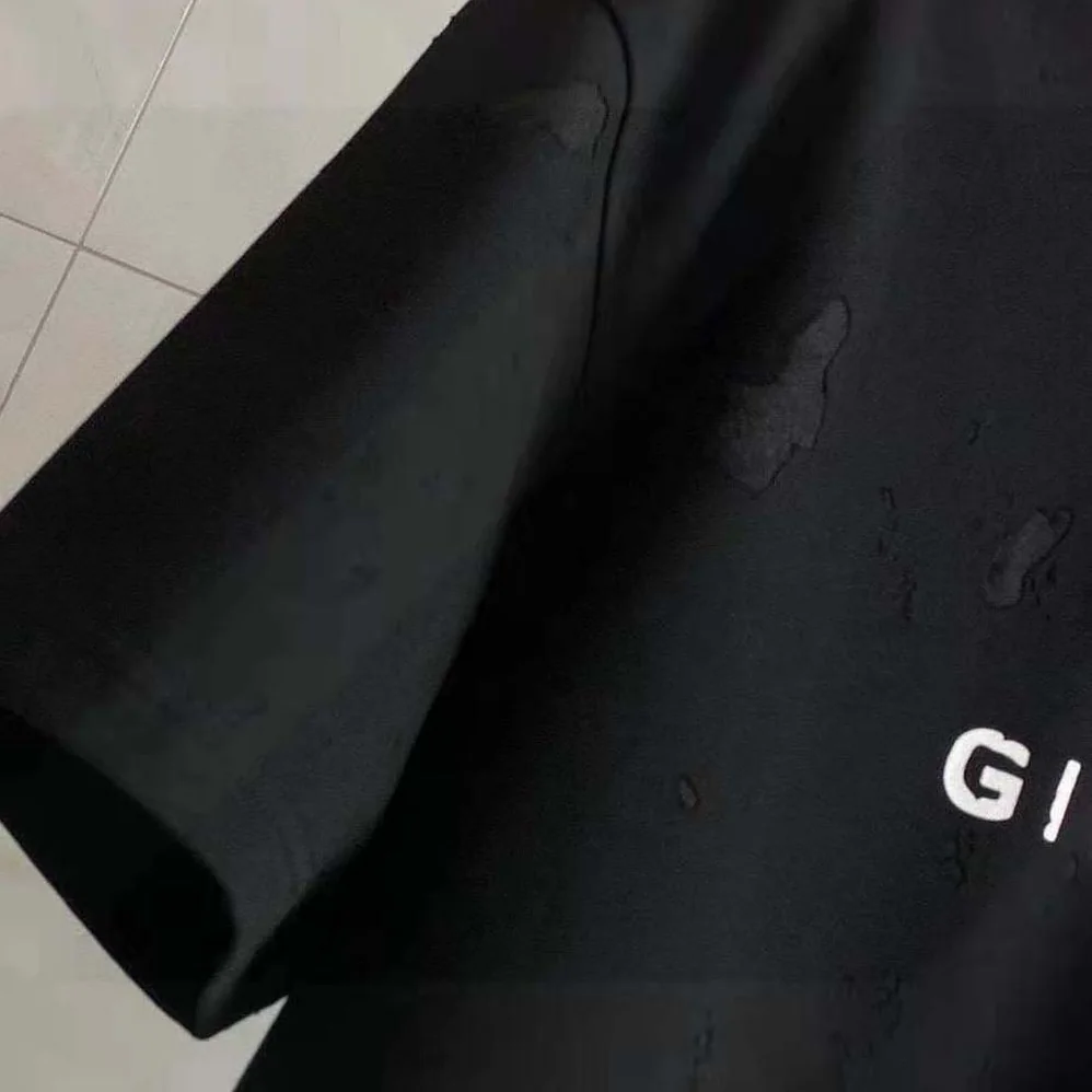 Givenchy Paris Destroyed T-Shirt for Men in Black Givenchy Paris Destroyed T-Shirt for Men in Black