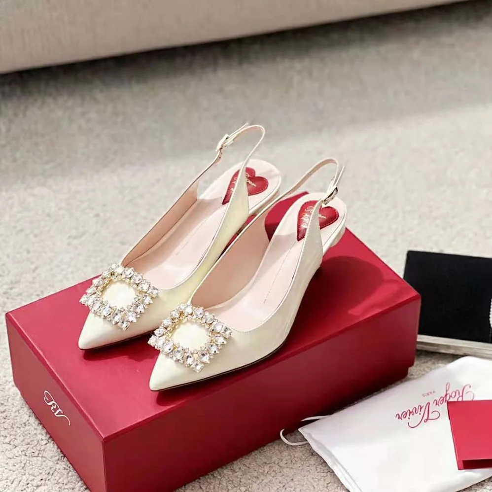 Roger Vivier Virgule Strass Buckle Slingback Pumps in Patent Leather for Women in White Roger Vivier Virgule Strass Buckle Slingback Pumps in Patent Leather for Women in White