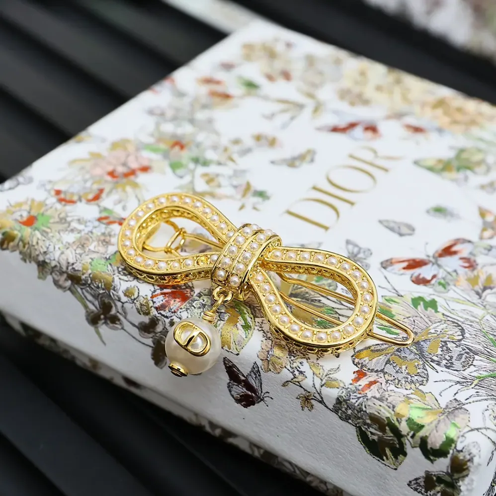 Dior Le Nœud de Dior Barrette Champagne-Finish Metal with a White Resin Pearl for Women