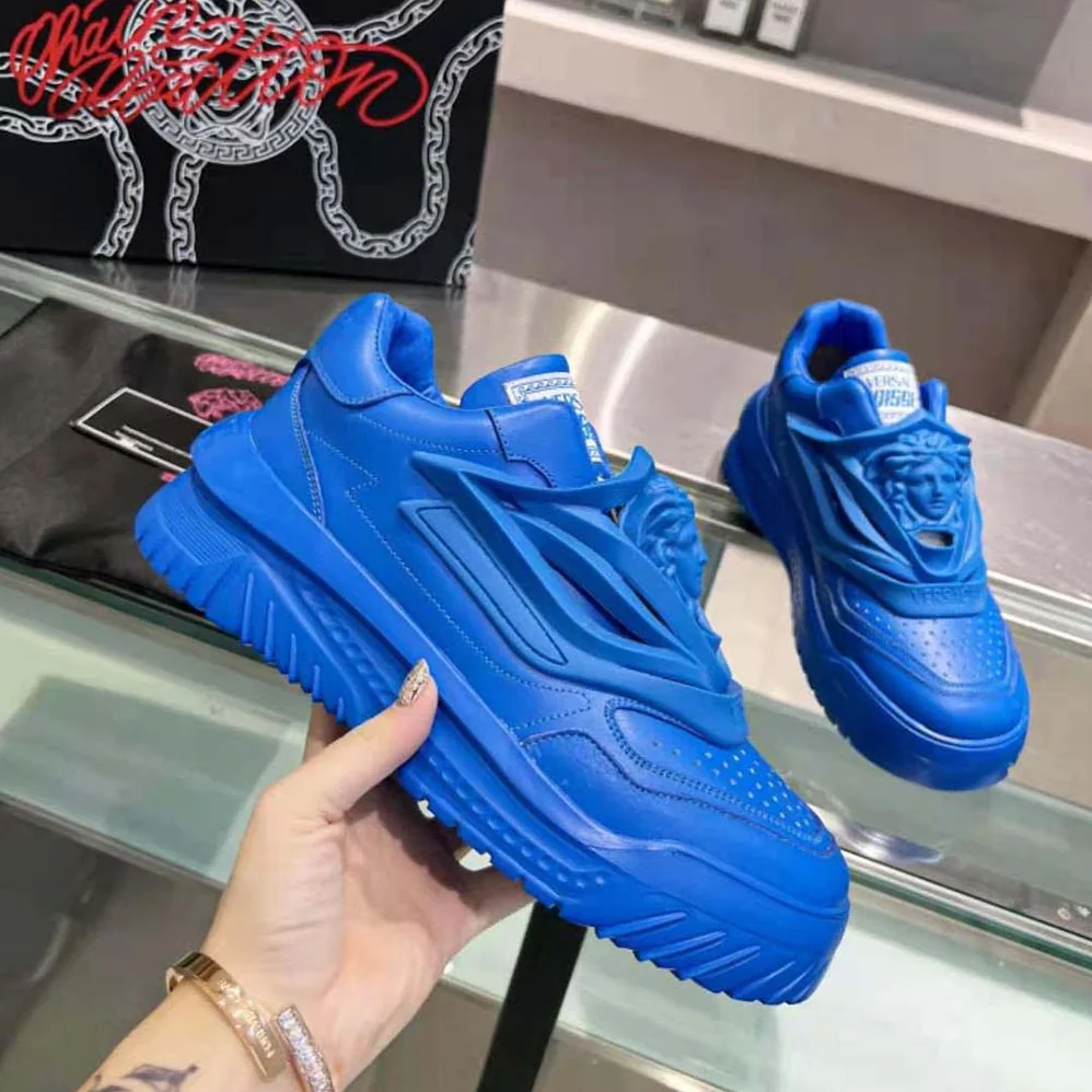 Versace Odissea Sneakers are Set on Rubber Soles with Perforated Toe Caps for Unisex in Blue Versace Odissea Sneakers are Set on Rubber Soles with Perforated Toe Caps for Unisex in Blue