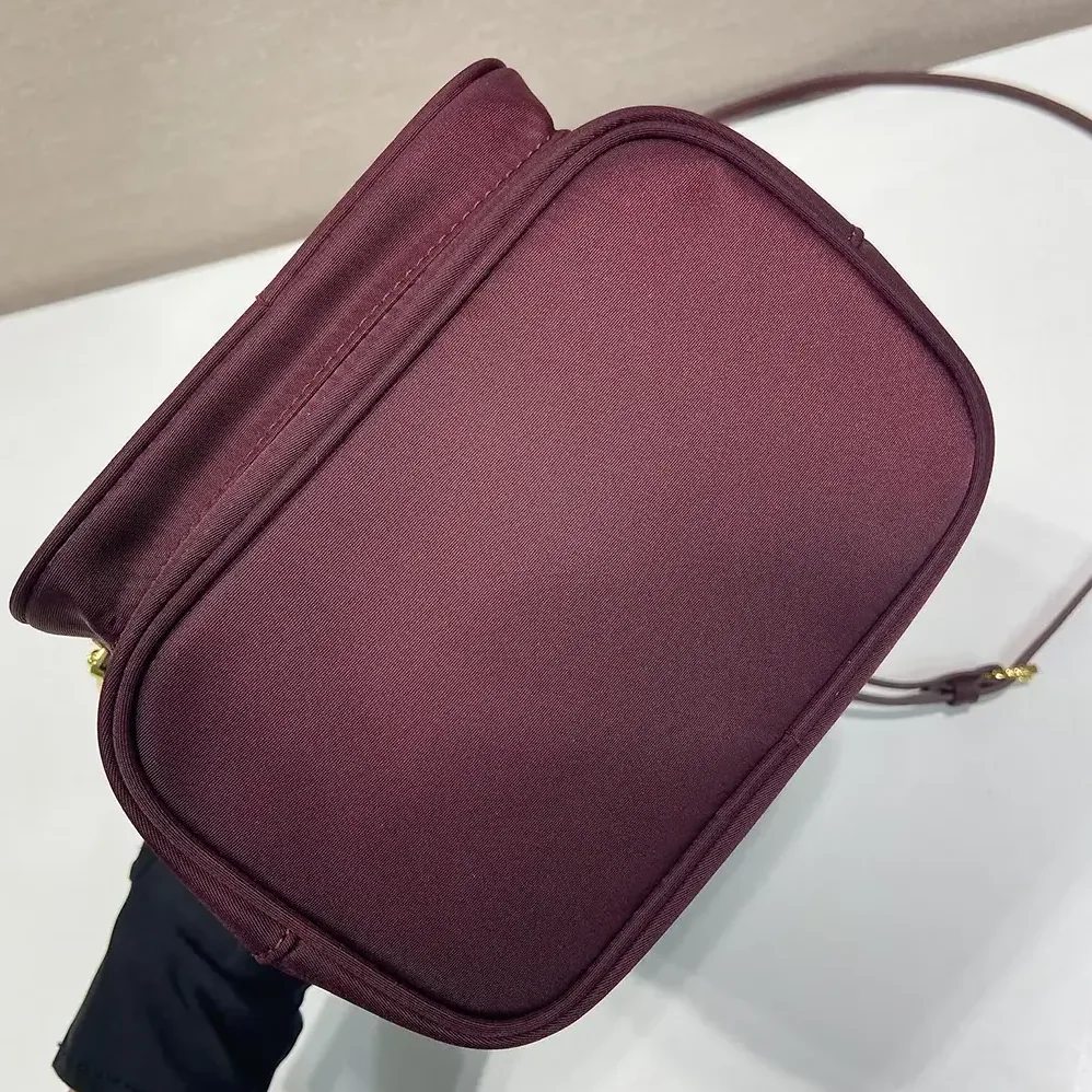 Prada Duet Re-Nylon Bucket Bag for Women in Maroon Prada Duet Re-Nylon Bucket Bag for Women in Maroon
